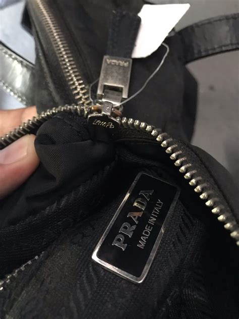 authentic prada lampo zipper|knock off Prada bags.